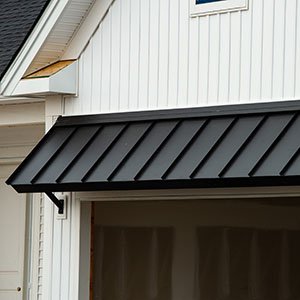 house with black metal awning
